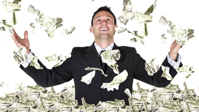 executivo-mergulhado-em-cedulas-de-dolar-original